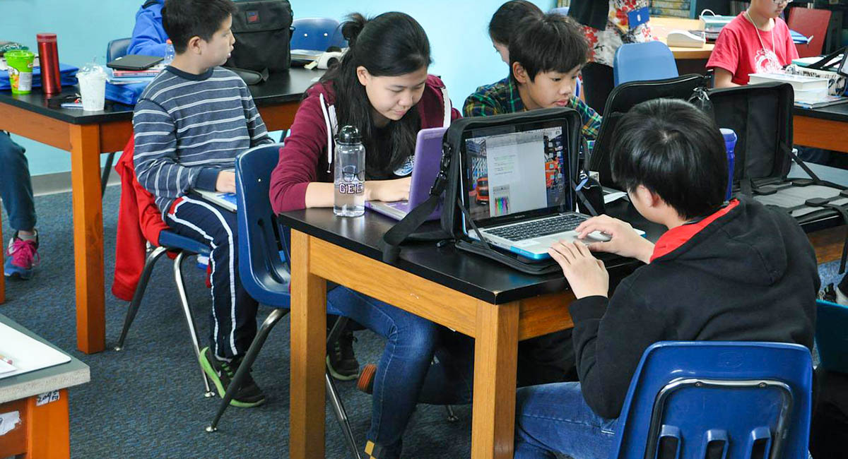 Children on computers in classroom