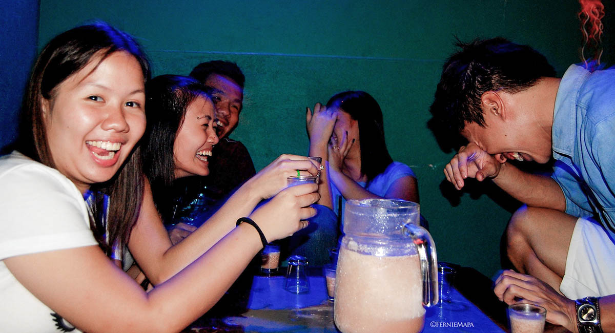 young people drinking in a club
