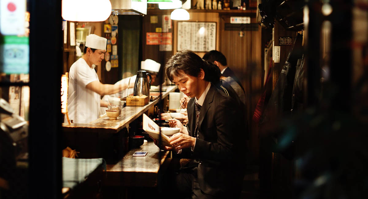 Japanese man in small restaurant