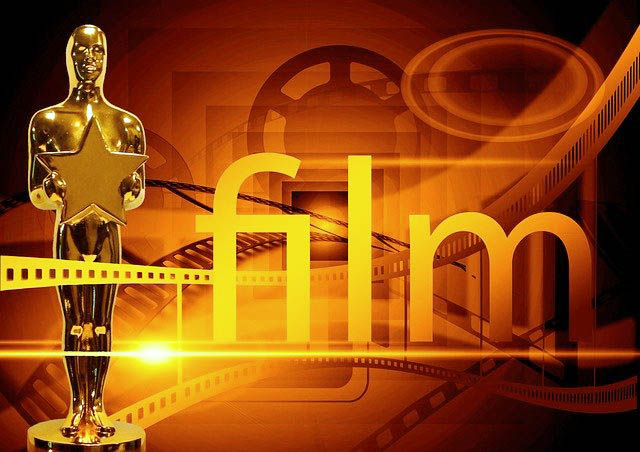 And the award goes to... Award statue with film graphics and word "film"