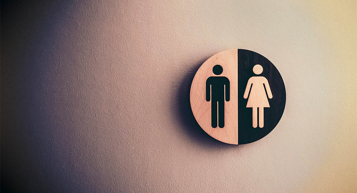 male female icons on circular sign