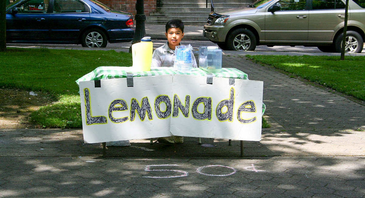 boy with lemonade stand