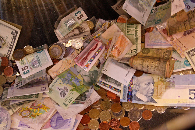 A pile of money from different countries Monies of the world