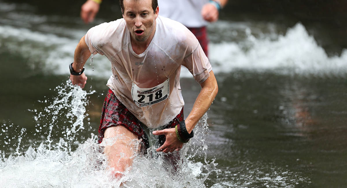steeplechase runner in water