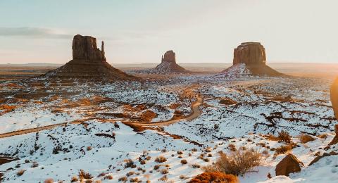 snow in desert with rock formations