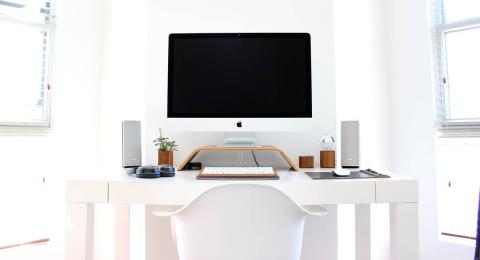 A neat desk with computer, white, home office