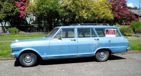 Blue car, station wagon, for sale sign