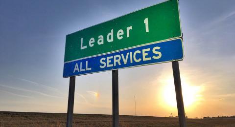 Highway exit sign "Leader 1 All Services"