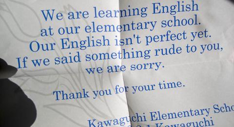Message on folded paper about Japanese children learning English