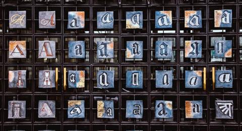Typesetting letter A in different fonts