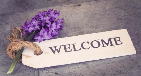 Hyacinth and tag with word "welcome"